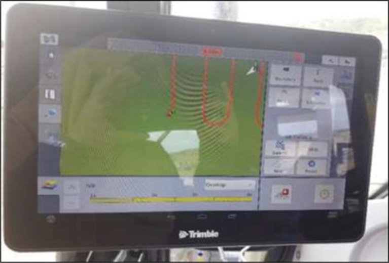 Figure 3. On-board display with recorded passes of the tractor in the experimental field.